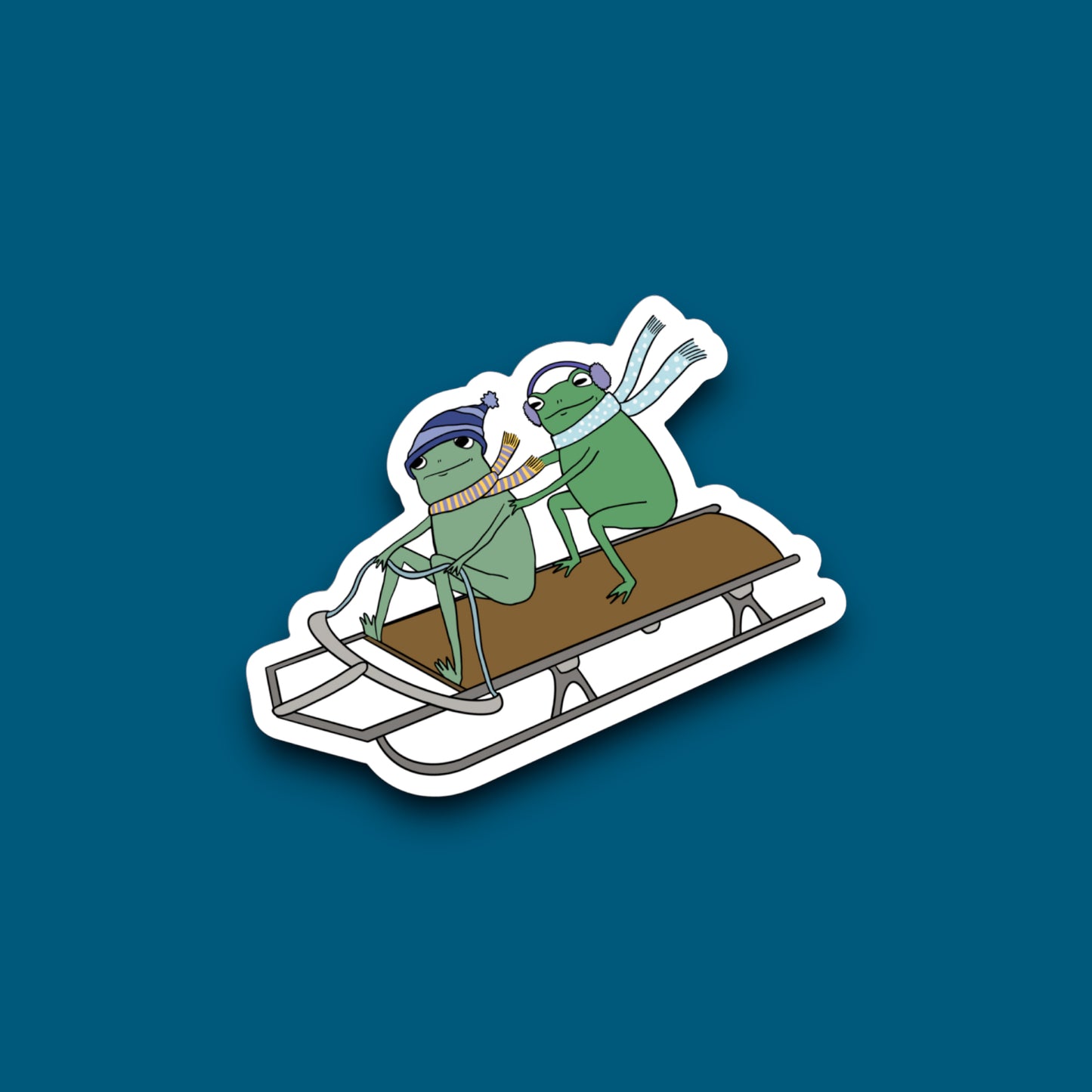 Sledding Frogs Sticker